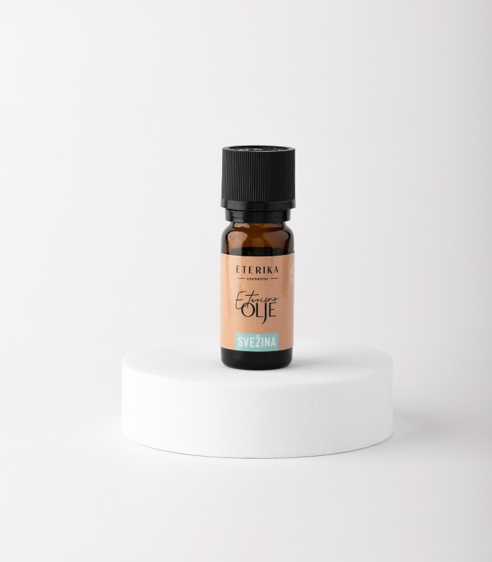 Eterično olje evkaliptusa in limone v steklenički, znano po svojih osvežujočih in poživljajočih lastnostih.