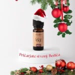 Eterično olje Pomaranča & Cimet v steklenički, idealno za ustvarjanje prijetnega in sproščujočega vzdušja.